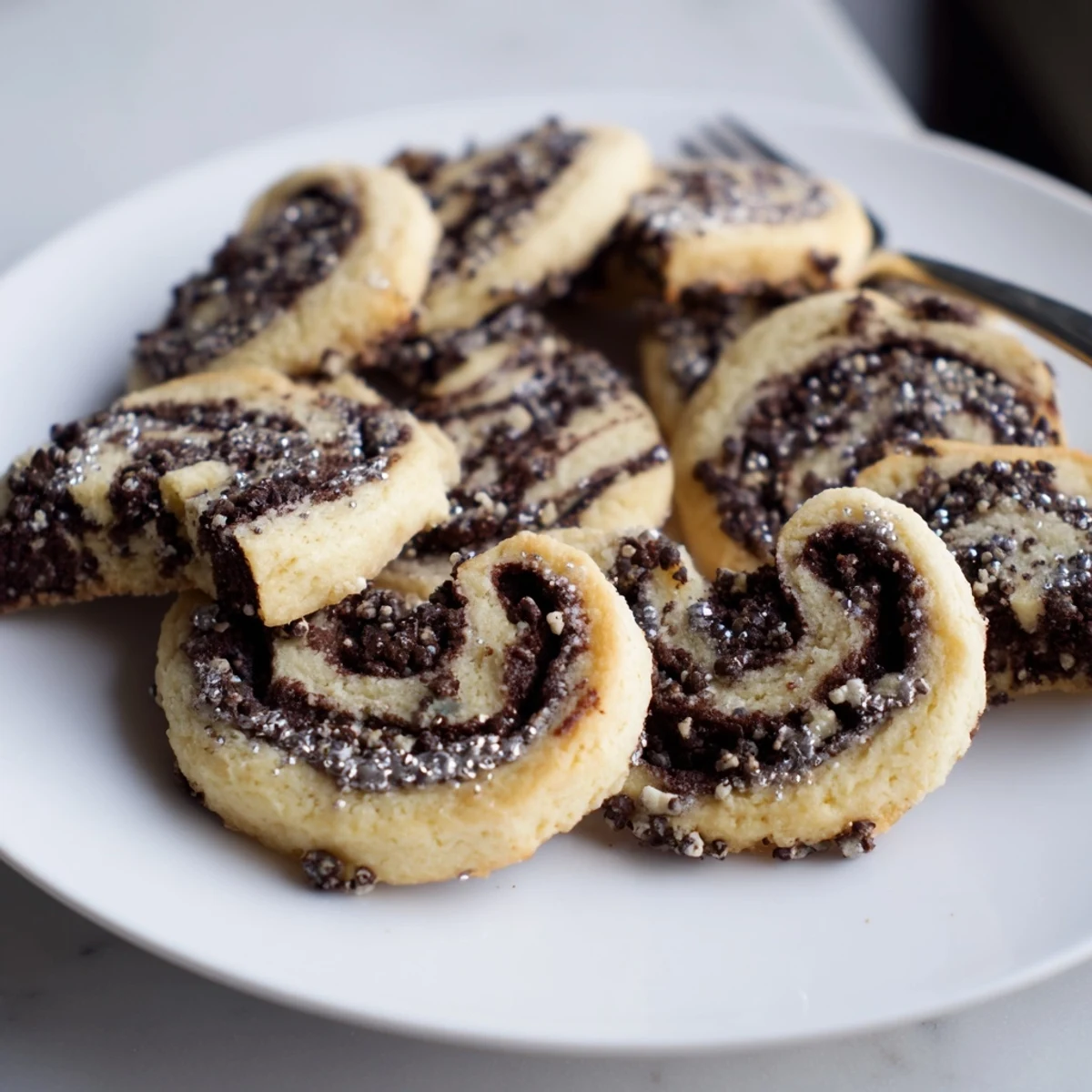 Buttery Festive Hanukkah Kokosh Christmas Cookies with rich chocolate and cinnamon swirl.