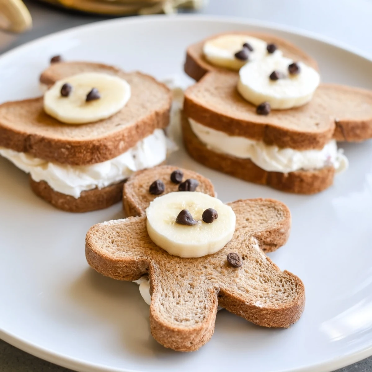 Sweet cream cheese filling oozes from these whimsical gingerbread man sandwich cutouts.