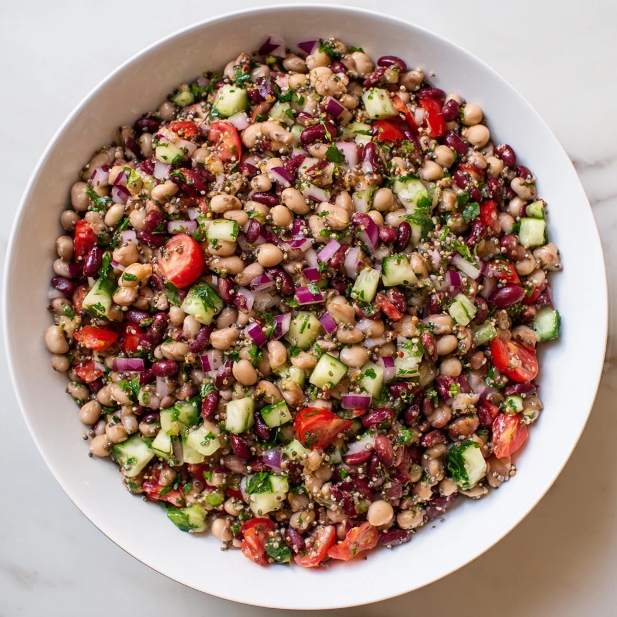 A vibrant bowl of Dense Bean Salad with Wellness Seeds, ready for a delicious, healthy meal.