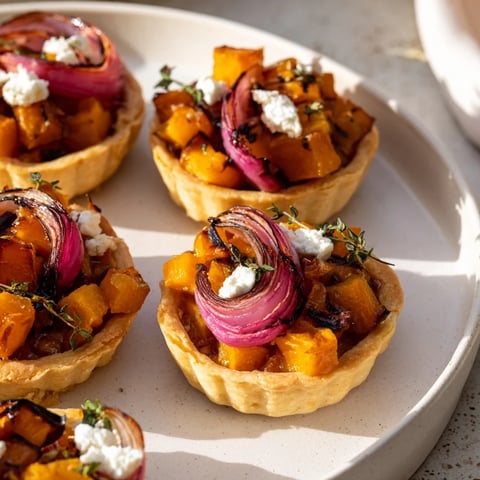 Golden-brown edges of Feuilles d’Érable Tartes Salées d’Automne show off the savory fall flavors.