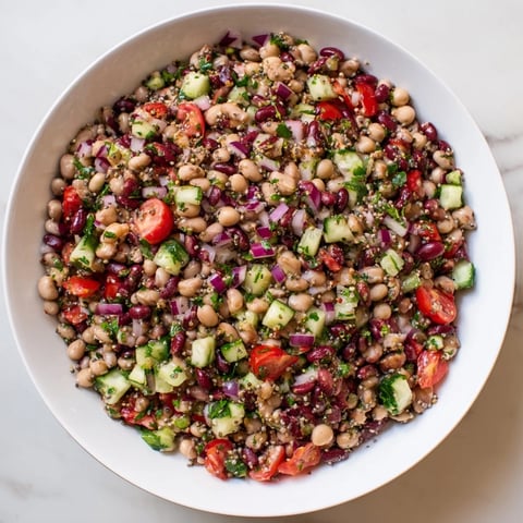 A vibrant bowl of Dense Bean Salad with Wellness Seeds, ready for a delicious, healthy meal.
