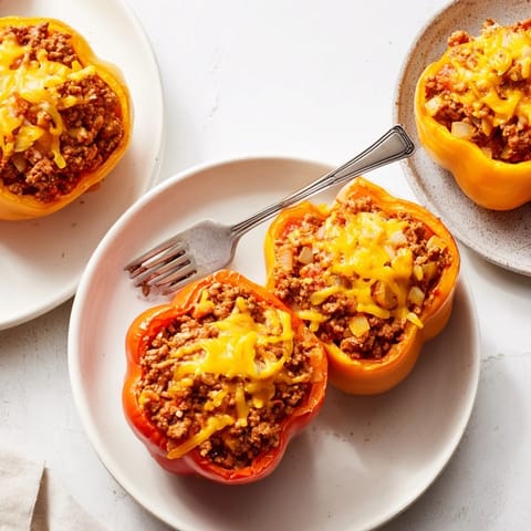 Flavorful Sloppy Joe Stuffed Bell Peppers with tender, vibrant peppers and a rich tomato sauce filling.