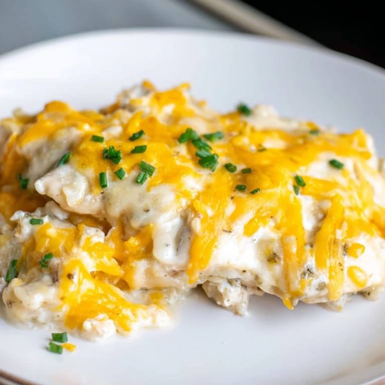 Savory Cheddar Ranch Chicken Bake with creamy ranch sauce and juicy chicken breasts.