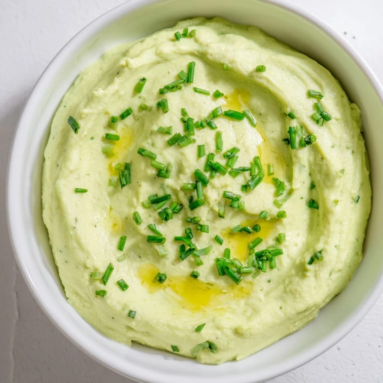 Vivid image of Avocado Cottage Cheese Dip, a healthy and easy spread with chives and creamy texture.